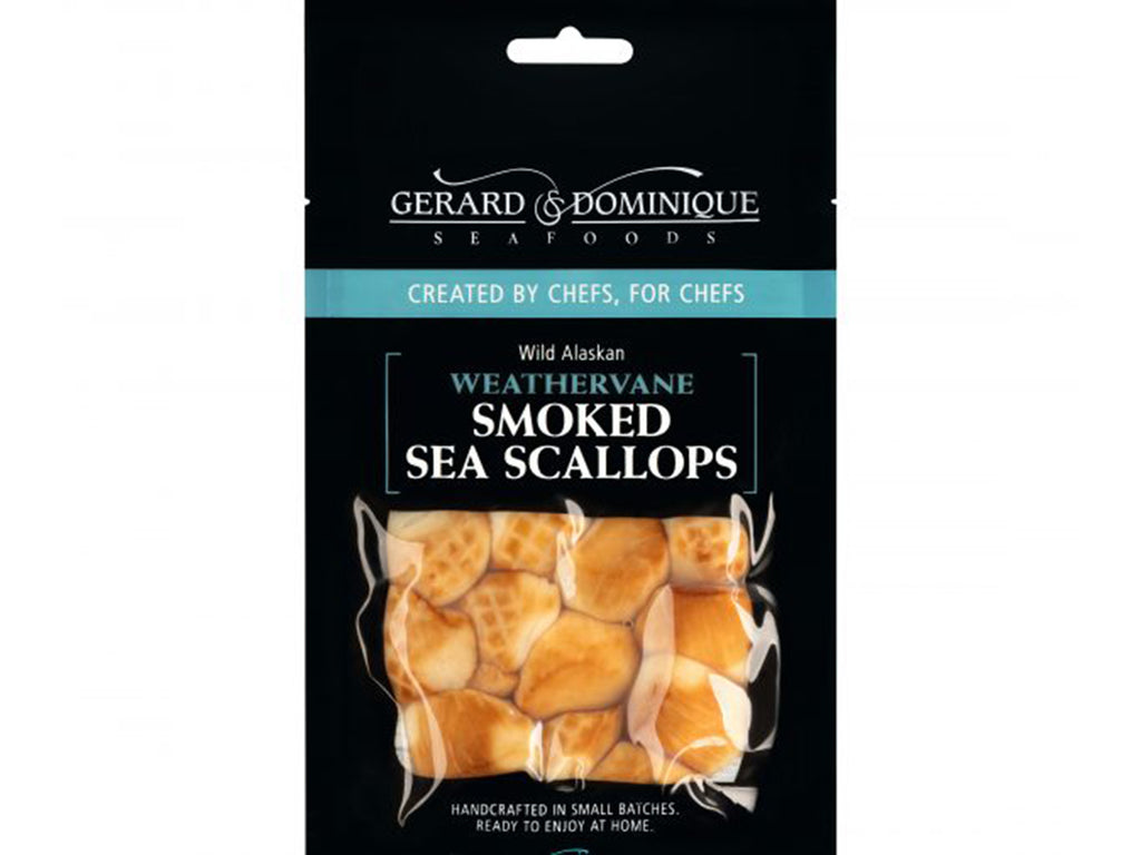 A vacuum sealed black pouch of smoked Sea Scallops.