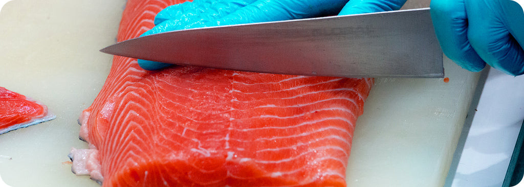 wild sockeye being portioned before being packed for next day delivery