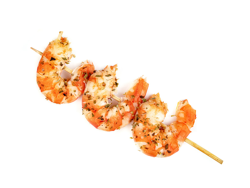 Skewered and grilled Black Tiger prawns.