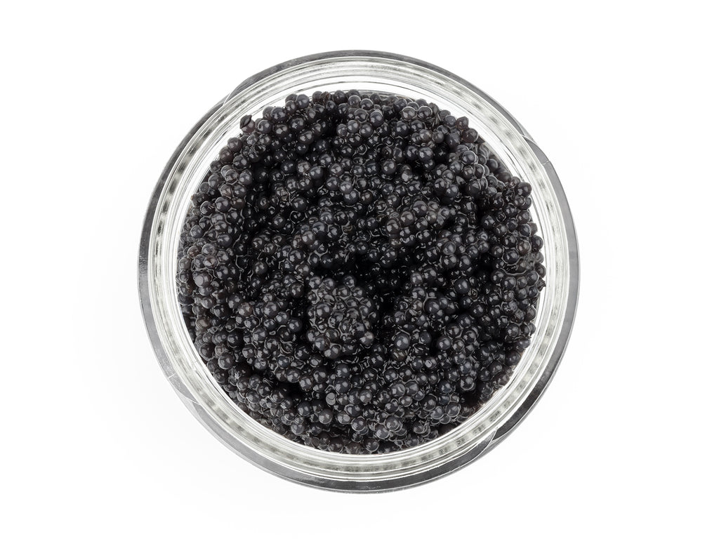 A birds eye view of Paddlefish Roe in a glass jar.